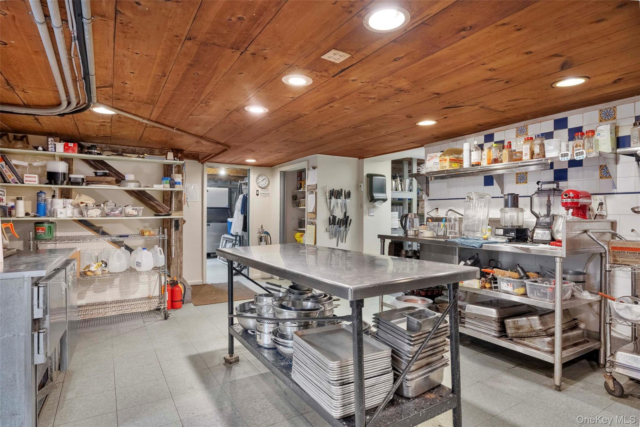 4494-4496 Highway 209 Stone Ridge, NY 12484 - Photo 29 of 48 a room with lots of furniture and white walls