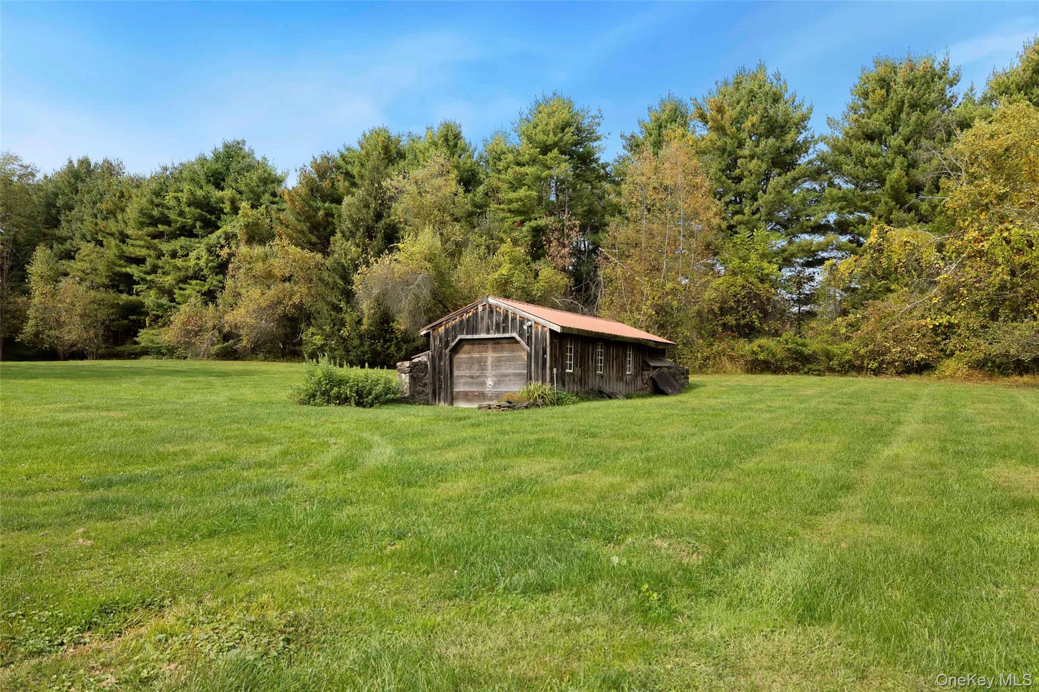 4494-4496 Highway 209 Stone Ridge, NY 12484 - Photo 33 of 48 a view of a house with a yard