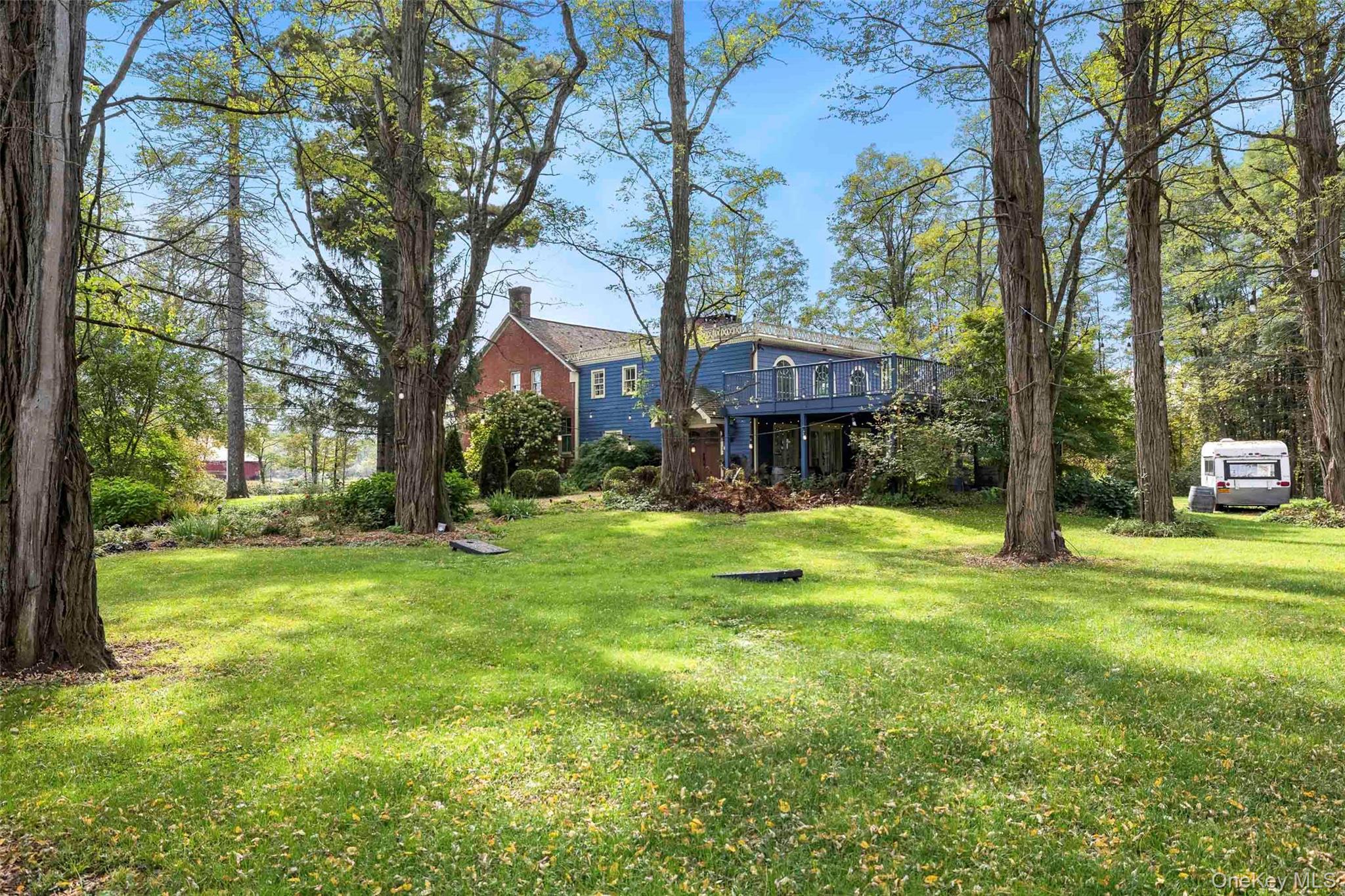 4494-4496 Highway 209 Stone Ridge, NY 12484 - Photo 35 of 48 a view of a house with a yard