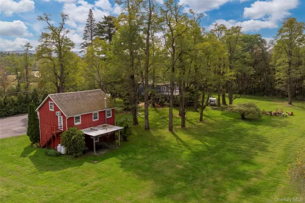 an aerial view of a house with a garden