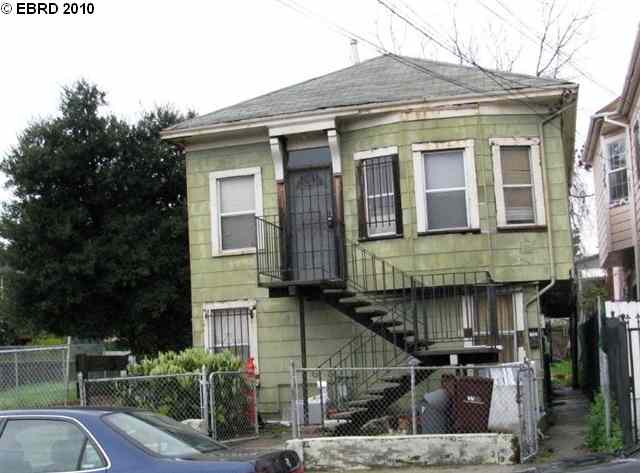 a front view of a house with garage