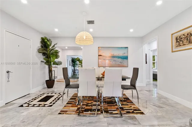 a living room with patio furniture