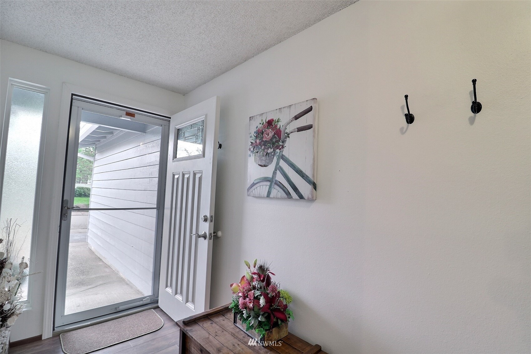 17234 139th Place Southeast Renton, WA 98058 - Photo 16 of 36 a view of a hallway with a flower pot