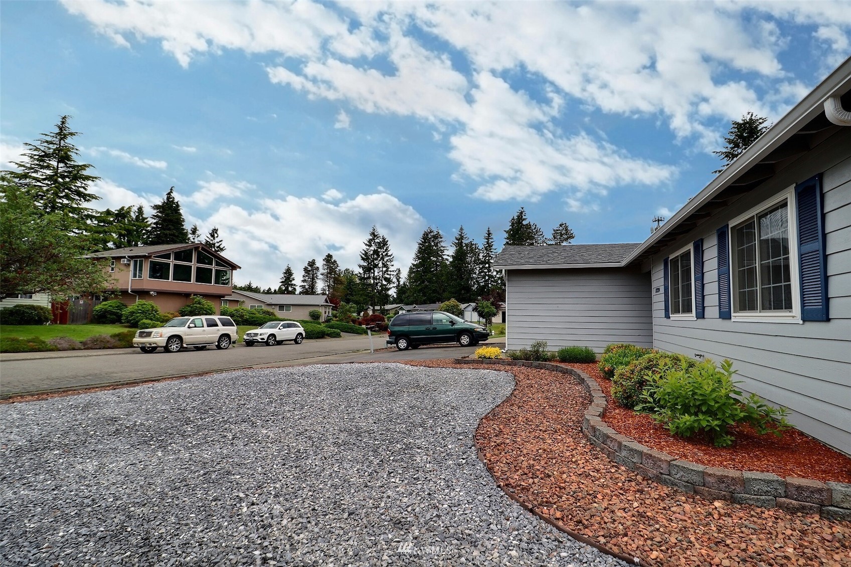 17234 139th Place Southeast Renton, WA 98058 - Photo 3 of 36 a view of a house with a patio