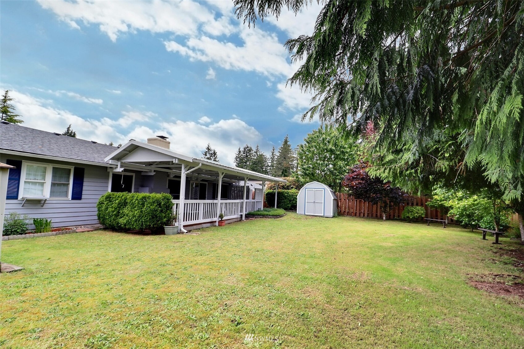 17234 139th Place Southeast Renton, WA 98058 - Photo 33 of 36 a view of a house with a yard and sitting area