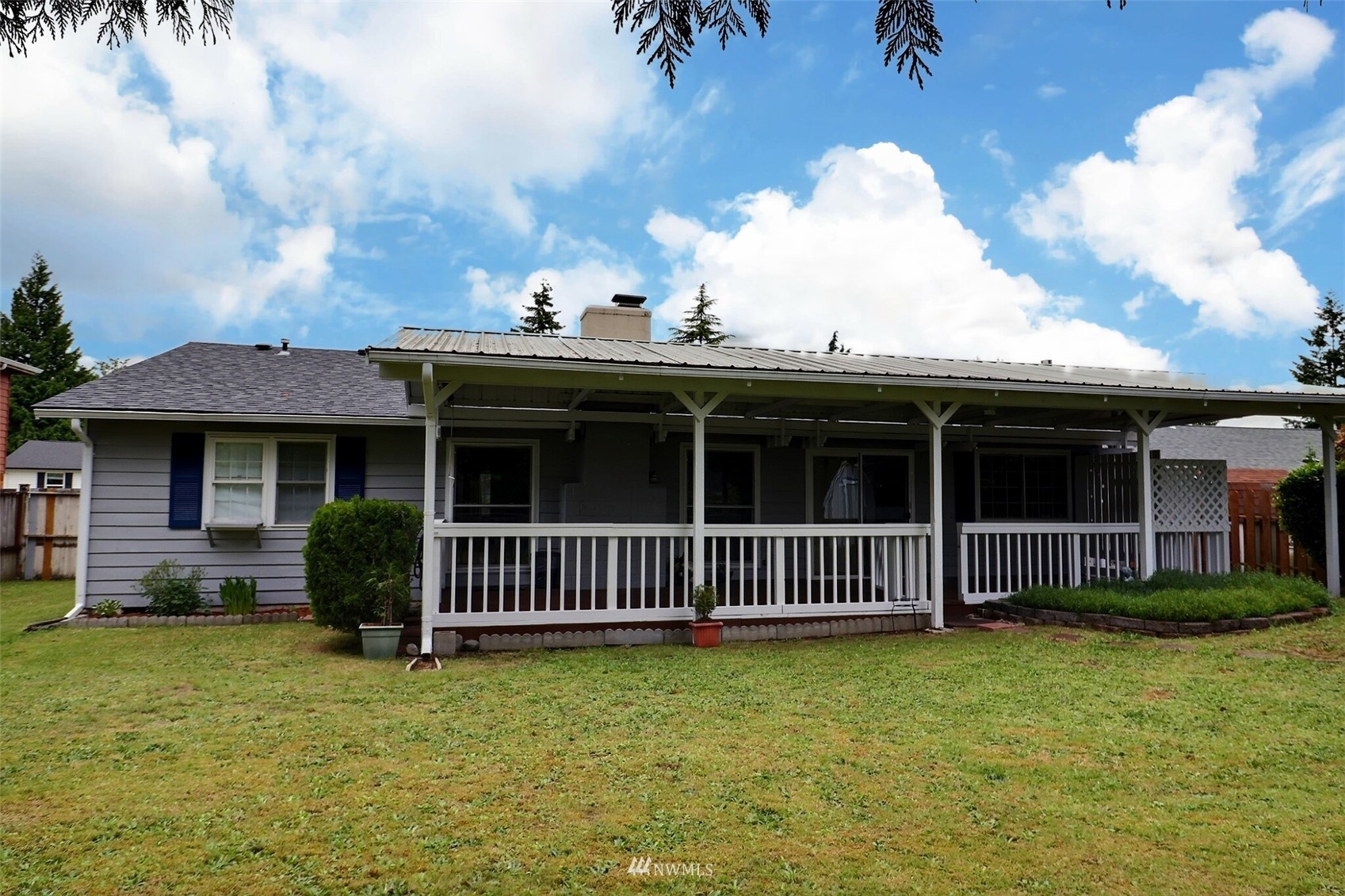 17234 139th Place Southeast Renton, WA 98058 - Photo 34 of 36 a view of a house with backyard and porch