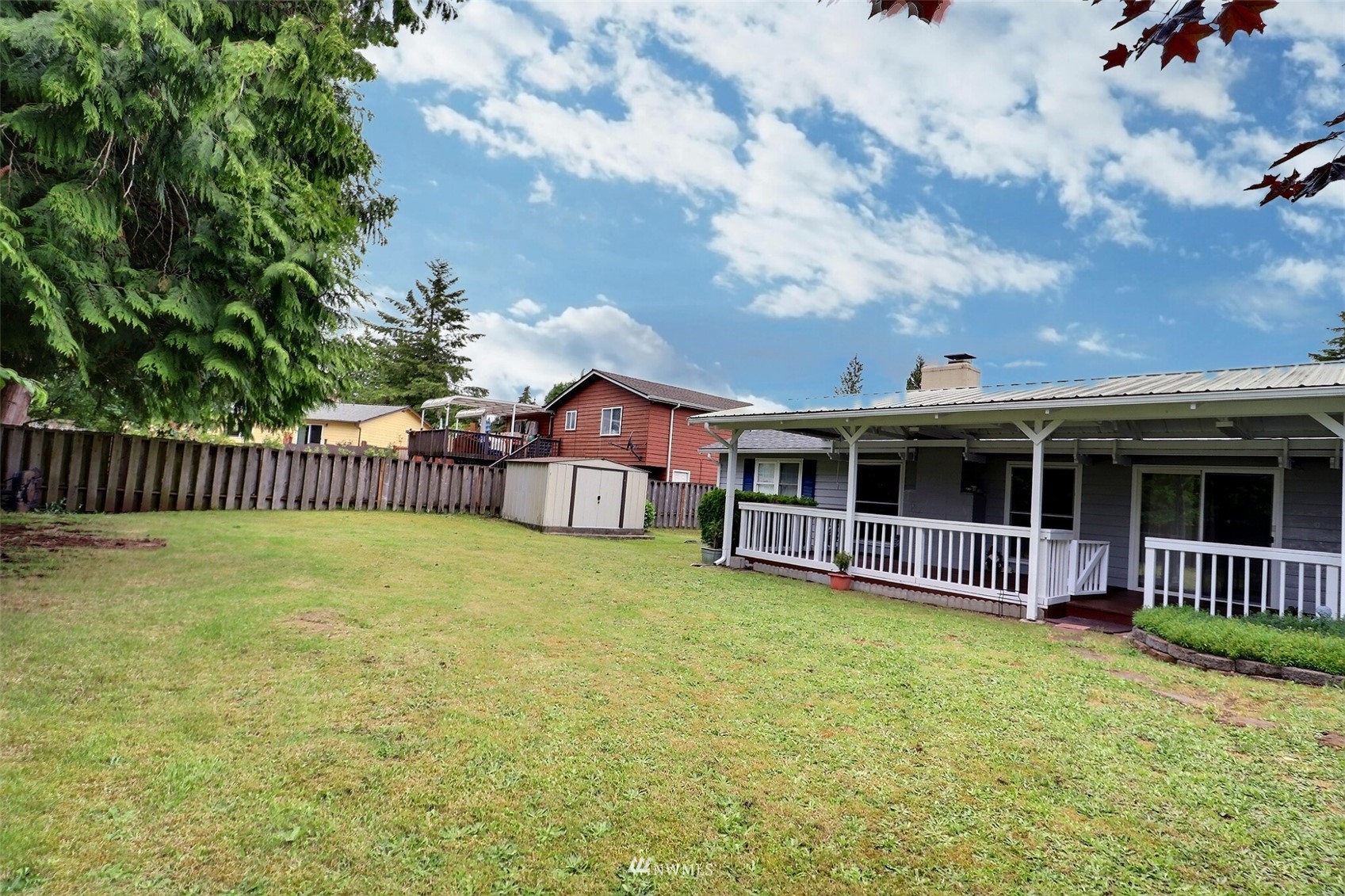 17234 139th Place Southeast Renton, WA 98058 - Photo 35 of 36 a view of a house with backyard and porch