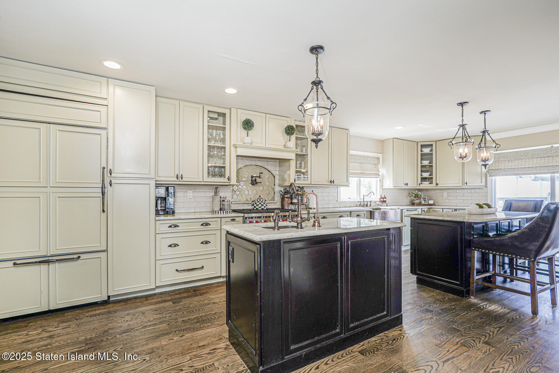 191 Rensselaer Avenue Staten Island, NY 10312 - Photo 13 of 36 a kitchen with stainless steel appliances granite countertop a sink stove and refrigerator