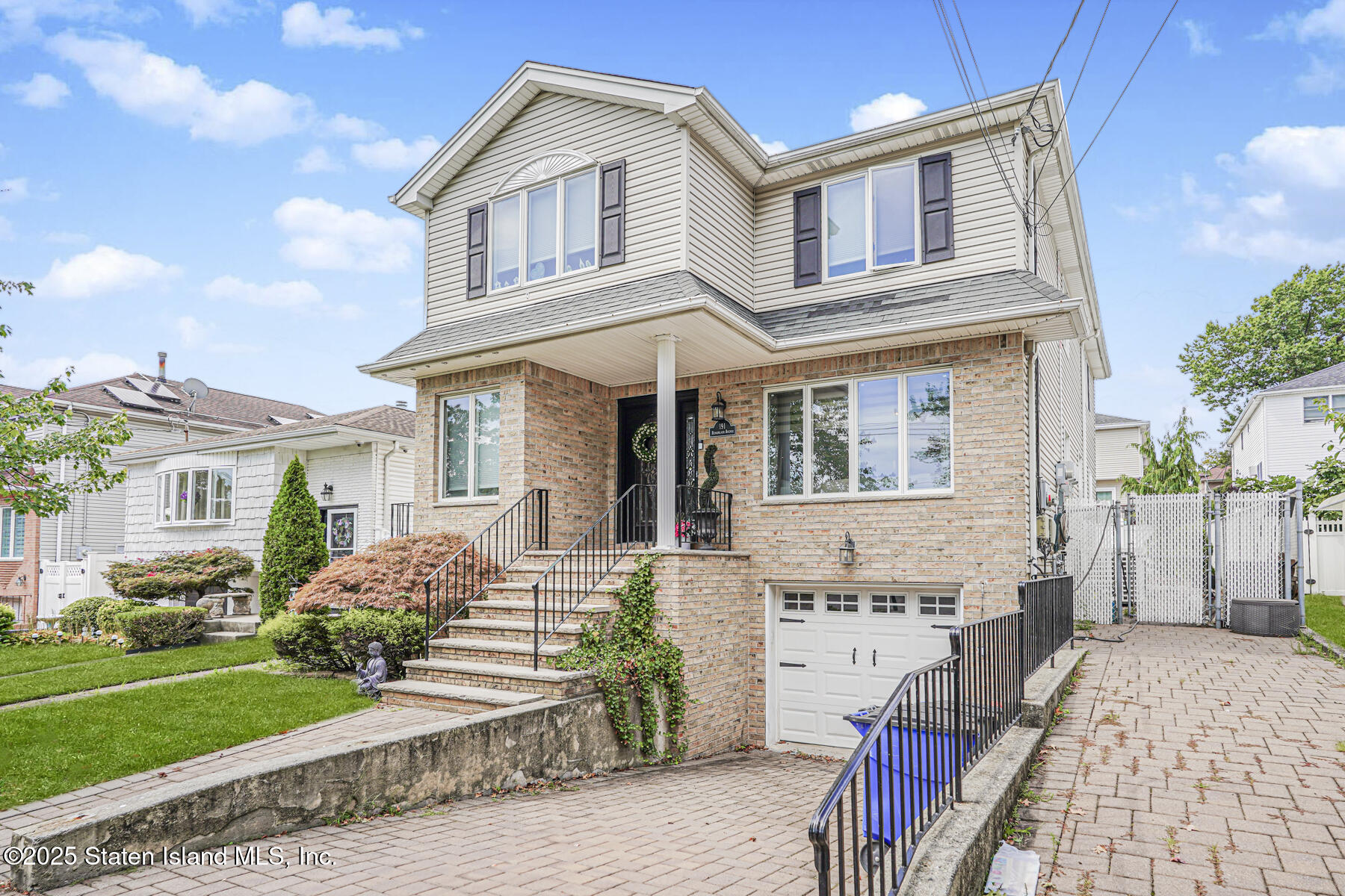 191 Rensselaer Avenue Staten Island, NY 10312 - Photo 2 of 36 a front view of a house with garden