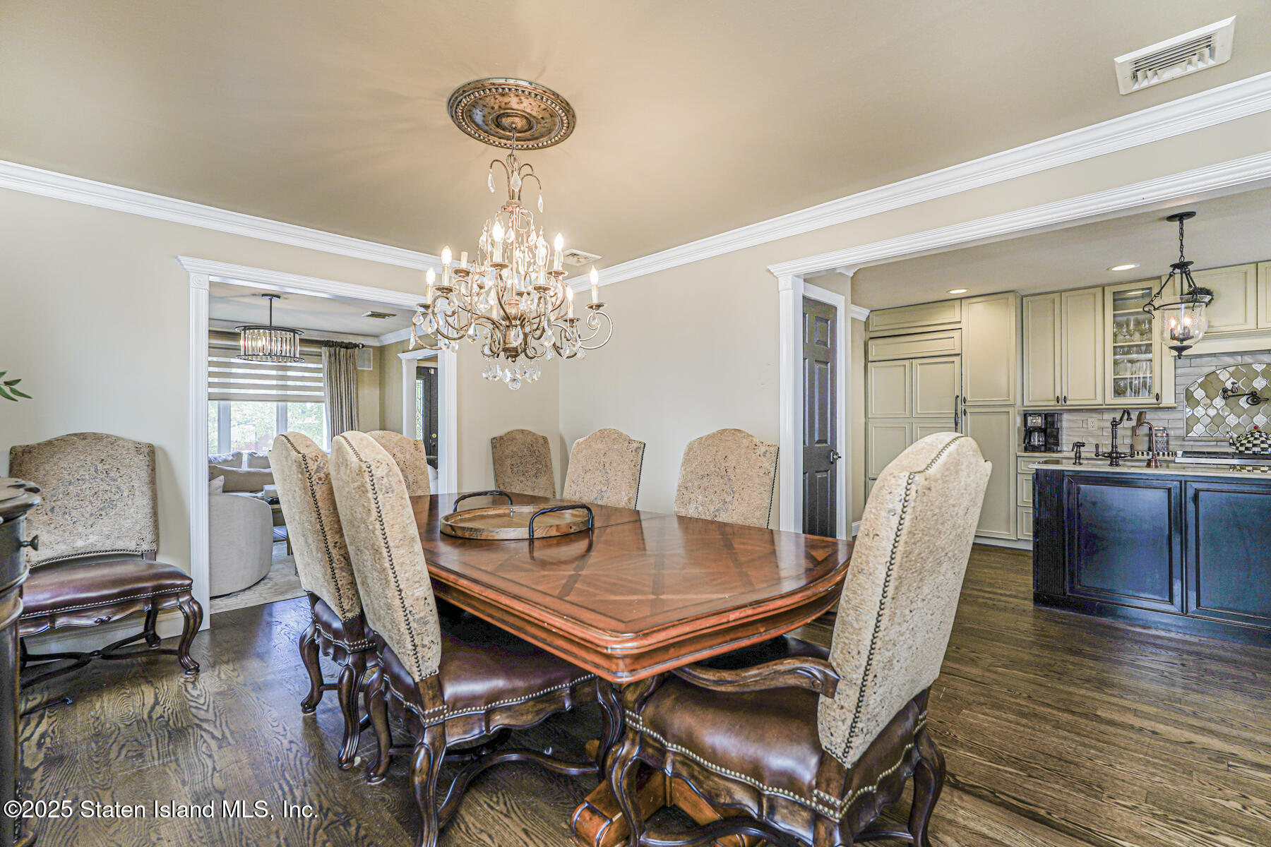 191 Rensselaer Avenue Staten Island, NY 10312 - Photo 26 of 36 a dining room with furniture and wooden floor