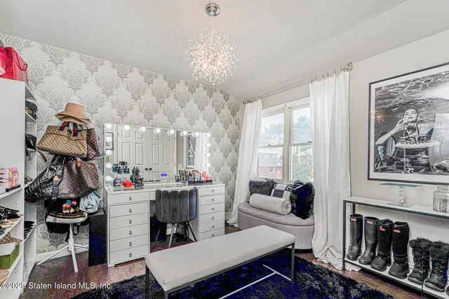 a bathroom with a sink toilet and mirror