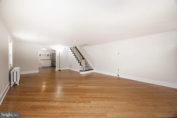 a view of a livingroom with wooden floor