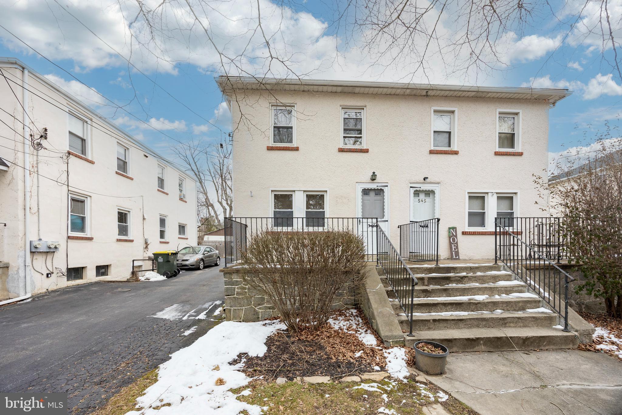 547 Northbrook Road West Chester, PA 19382 - Photo 2 of 35 a front view of a house with a garden