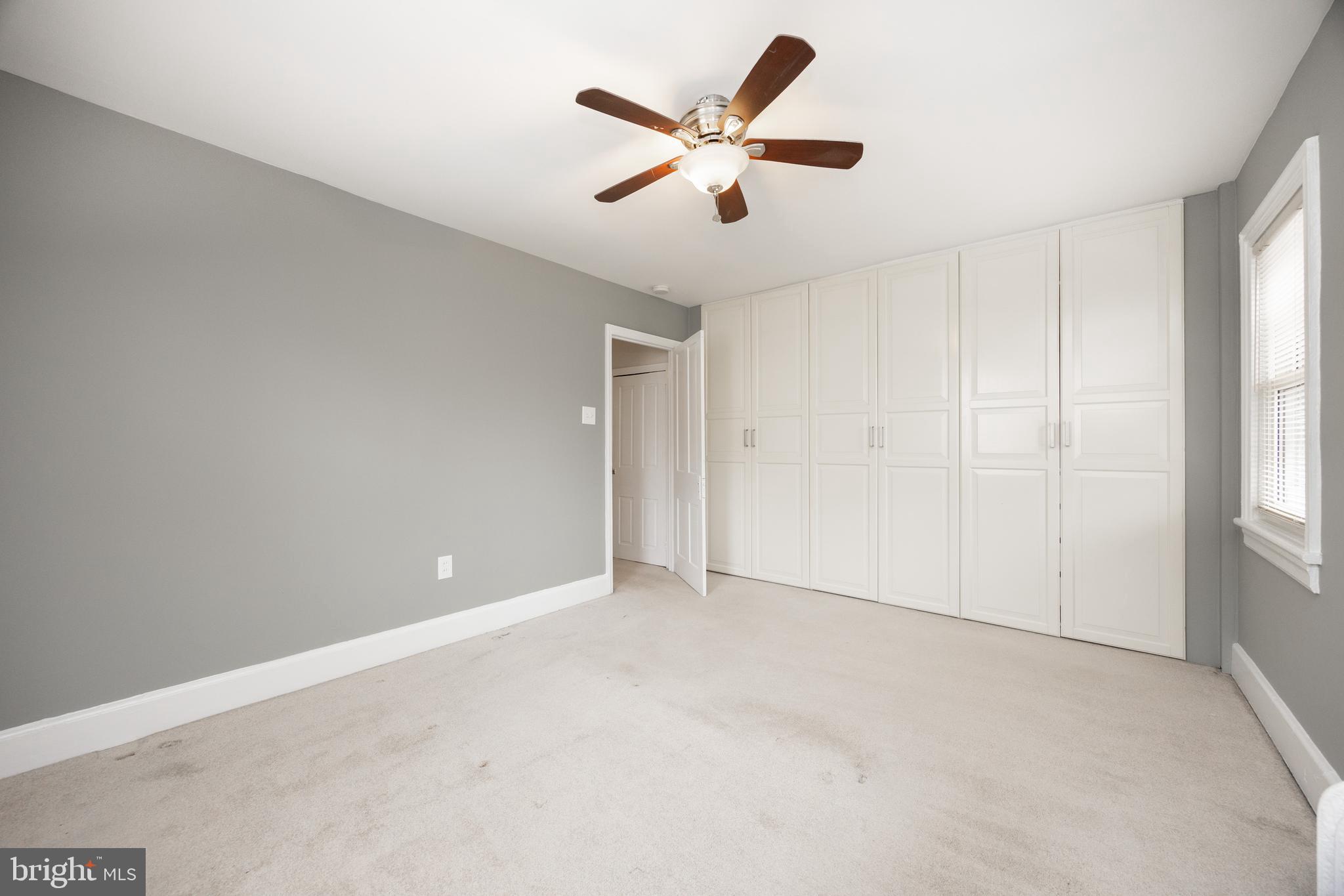 547 Northbrook Road West Chester, PA 19382 - Photo 22 of 35 an empty room with ceiling fan and window