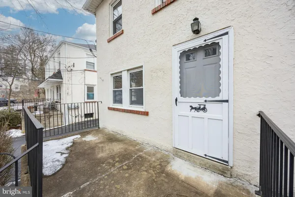 a view of a house with a wooden door