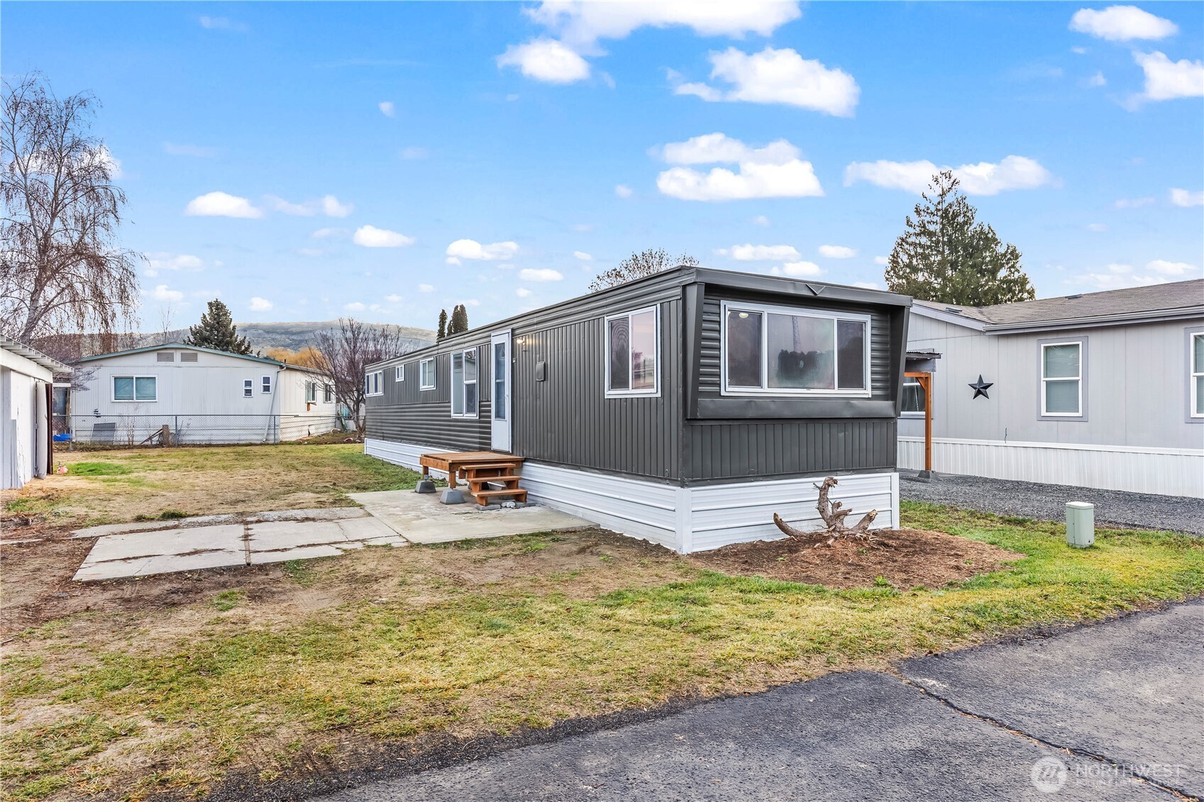 110 Sage Trail Road, Unit 13 Yakima, WA 98901 - Photo 11 of 16 a view of a house with swimming pool and sitting area