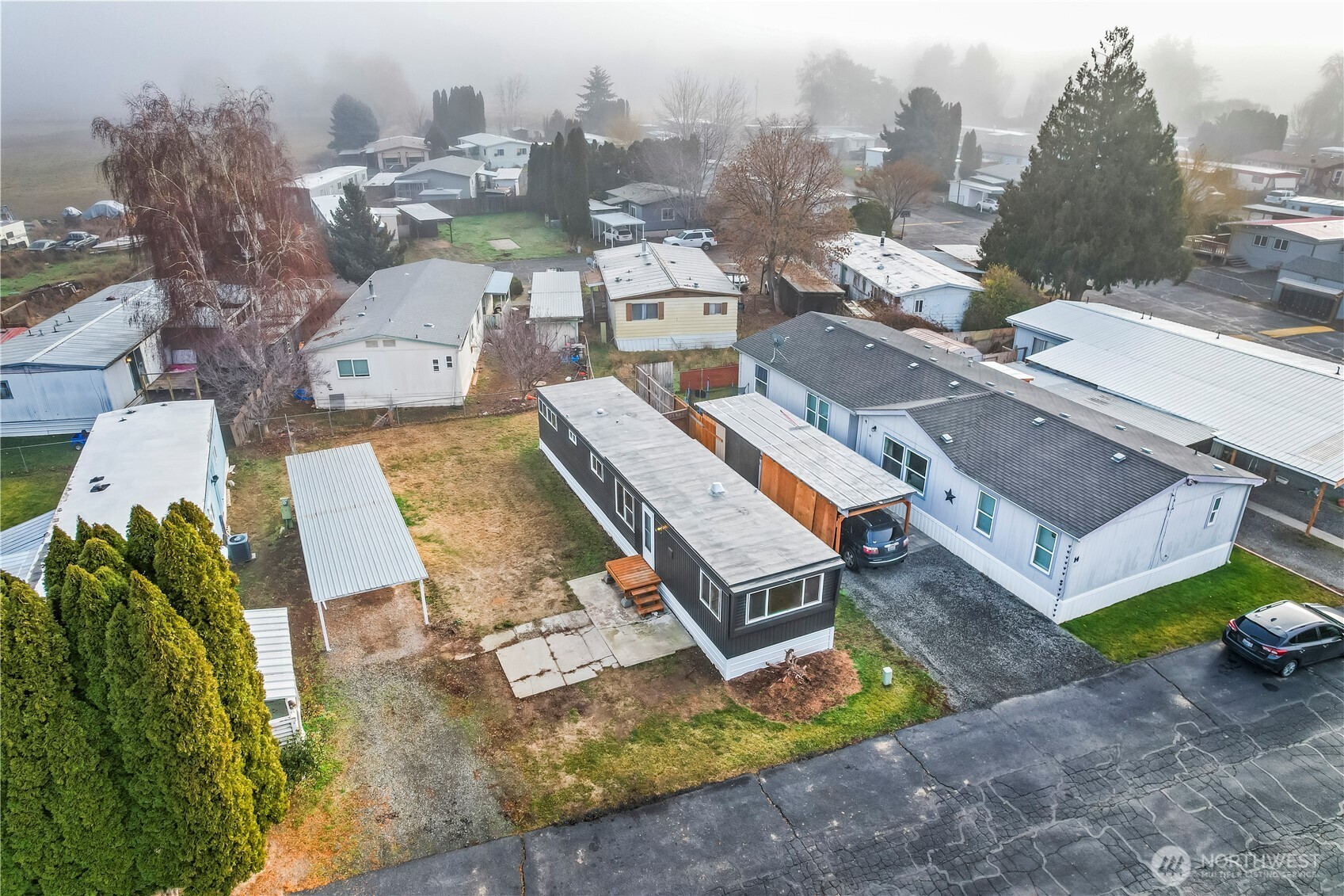 110 Sage Trail Road, Unit 13 Yakima, WA 98901 - Photo 13 of 16 an aerial view of a city with lots of residential buildings