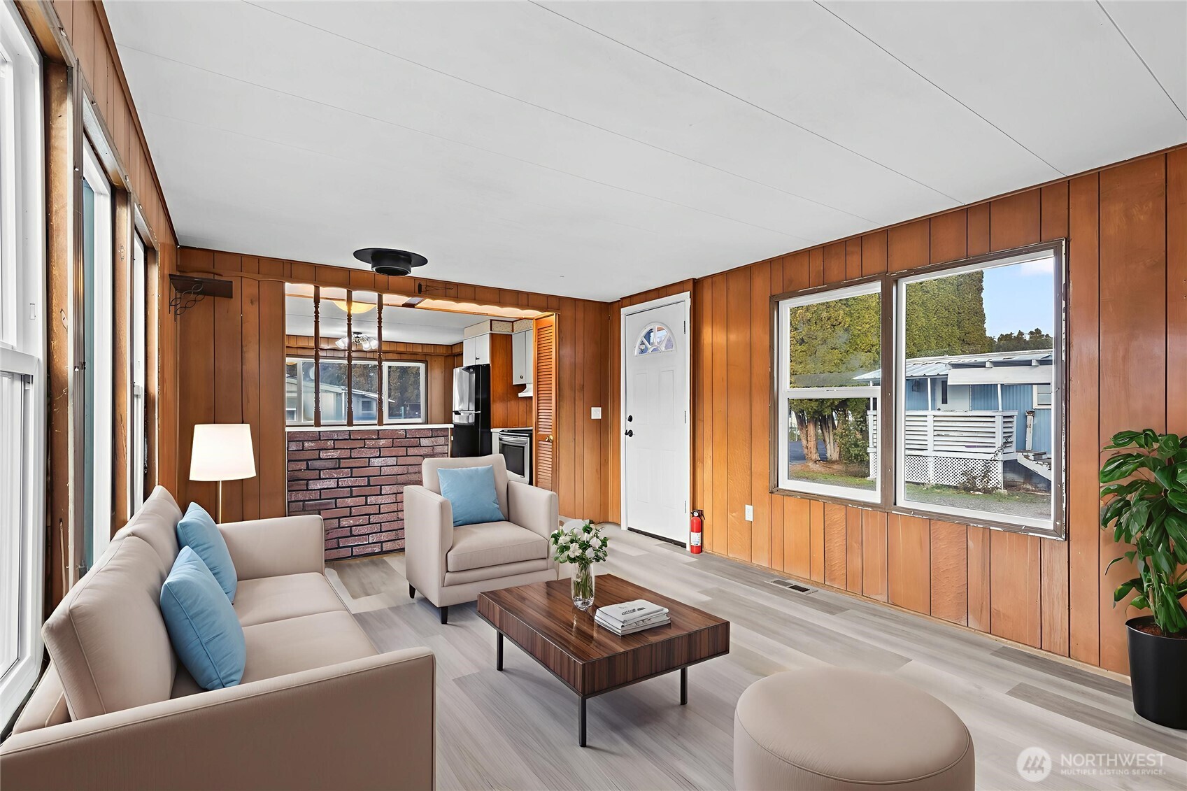 110 Sage Trail Road, Unit 13 Yakima, WA 98901 - Photo 2 of 16 a living room with furniture and a large window