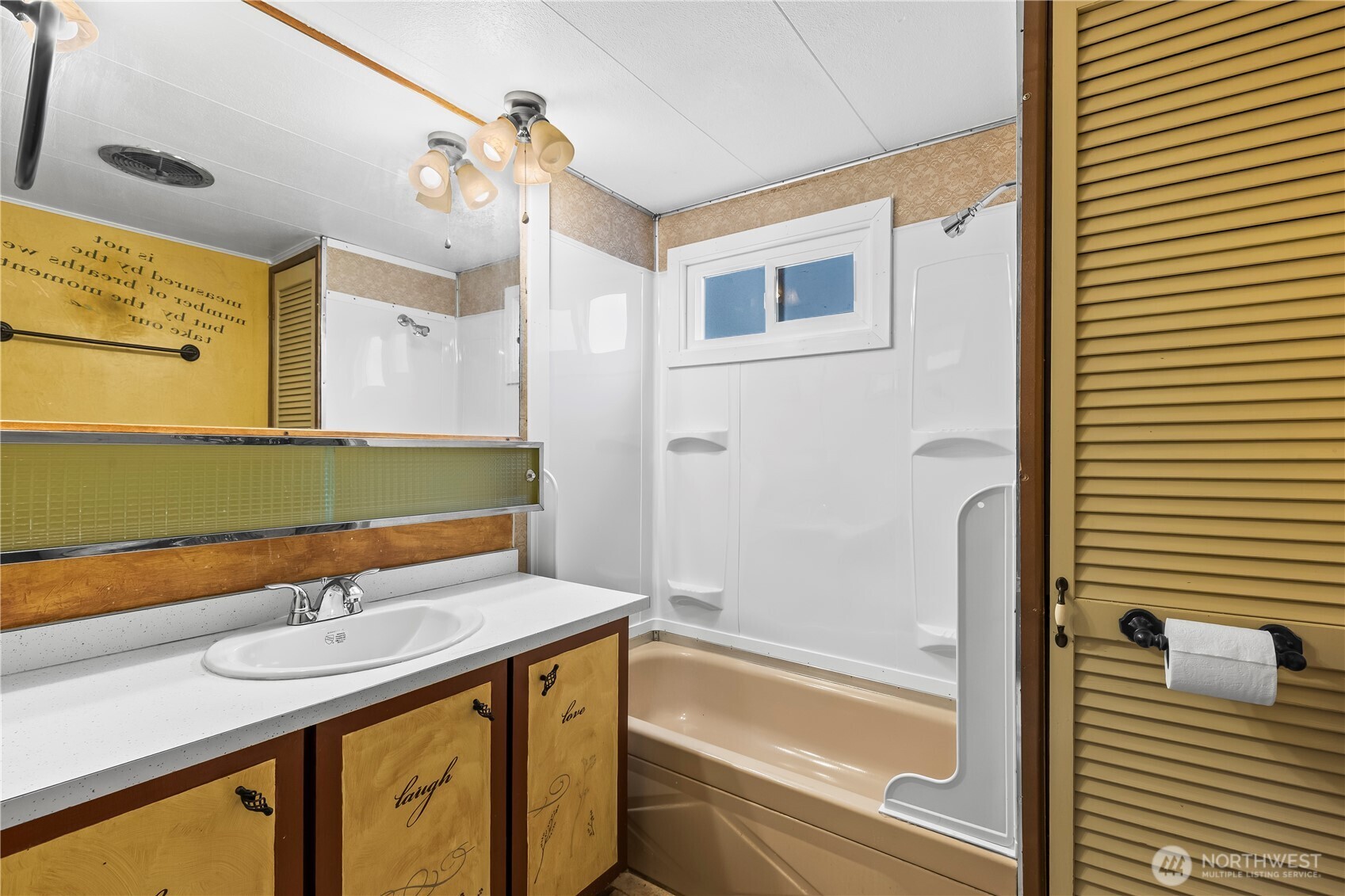 110 Sage Trail Road, Unit 13 Yakima, WA 98901 - Photo 7 of 16 a bathroom with a sink and a bathtub