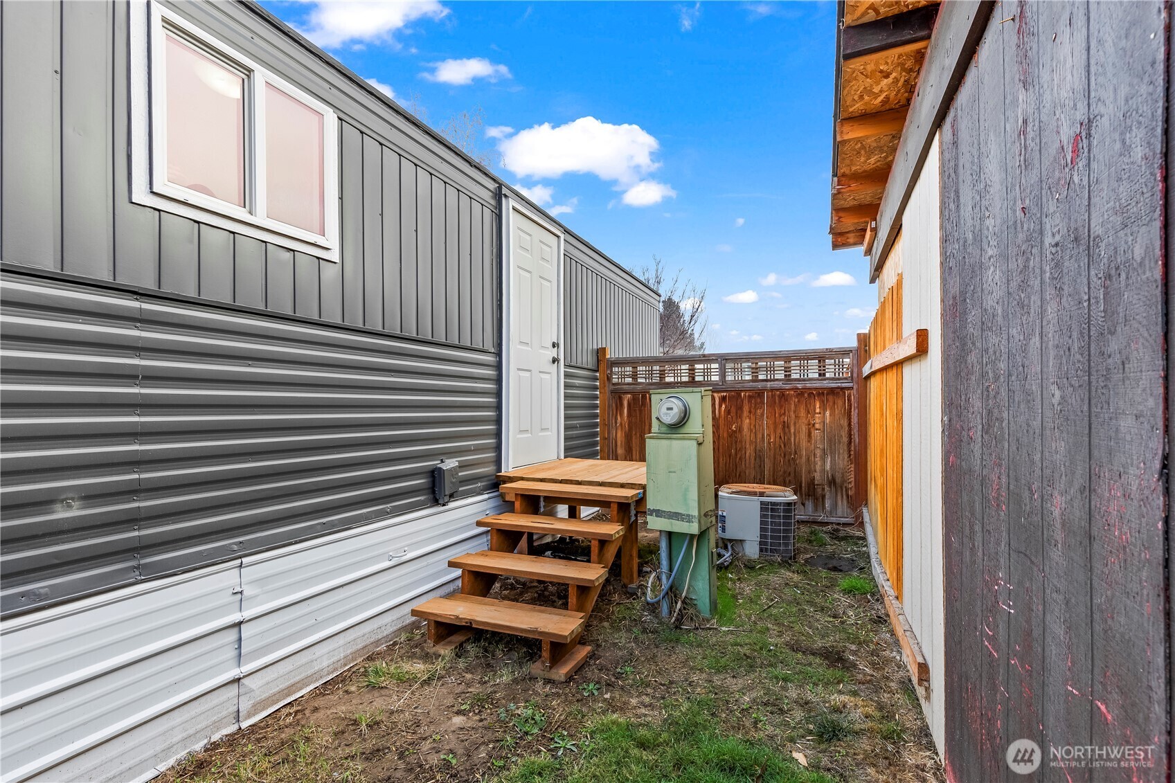 110 Sage Trail Road, Unit 13 Yakima, WA 98901 - Photo 9 of 16 a view of a chairs in a patio
