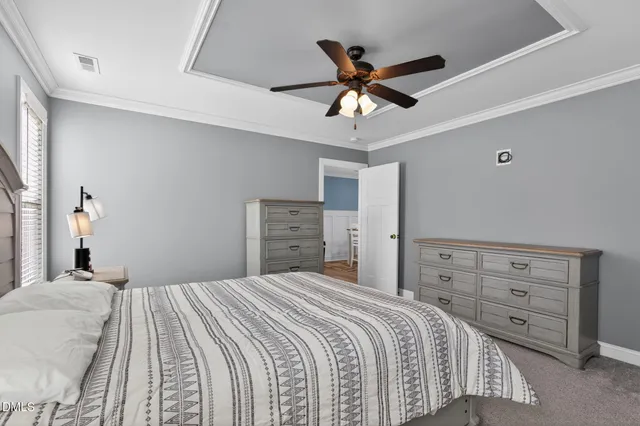 a bedroom with a bed and closet