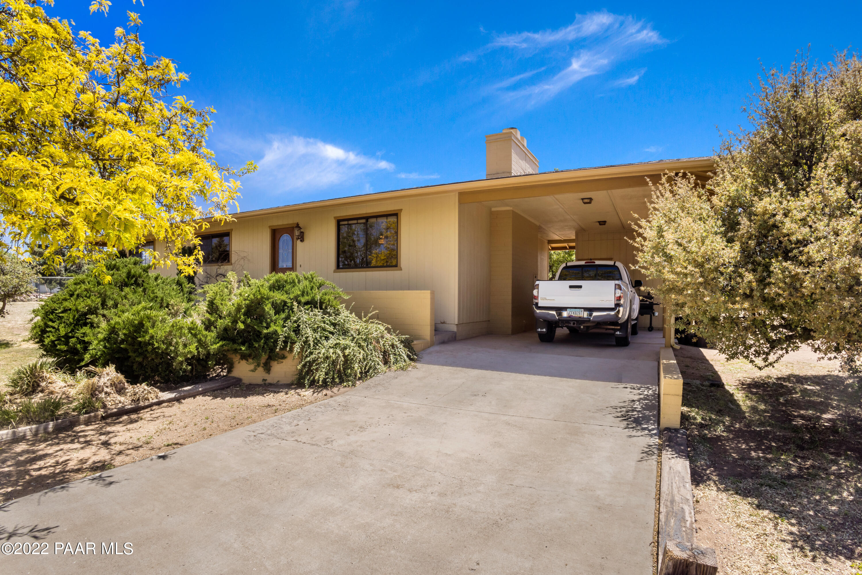 1481 West Cliff Rose Road Prescott, AZ 86305 - Photo 1 of 38 a car parked in front of a house
