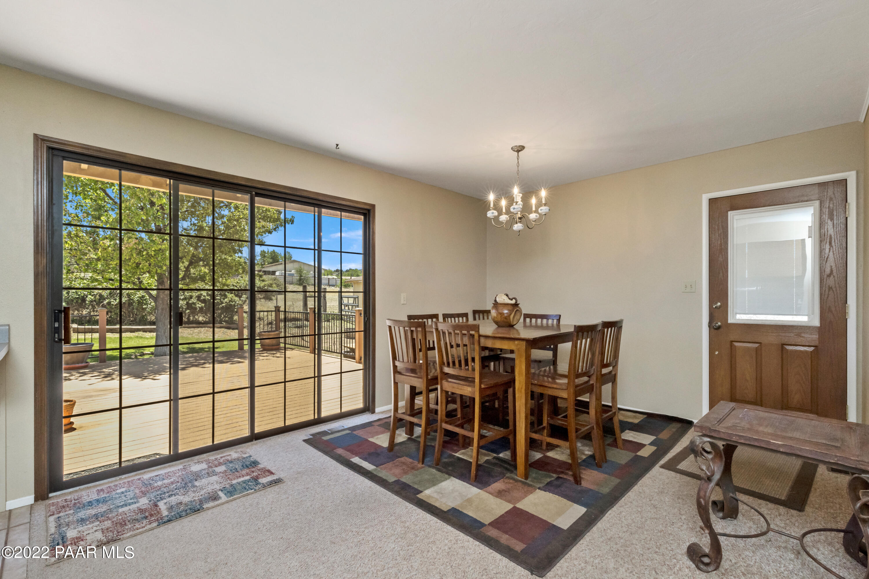 1481 West Cliff Rose Road Prescott, AZ 86305 - Photo 12 of 38 a dining room with furniture and window