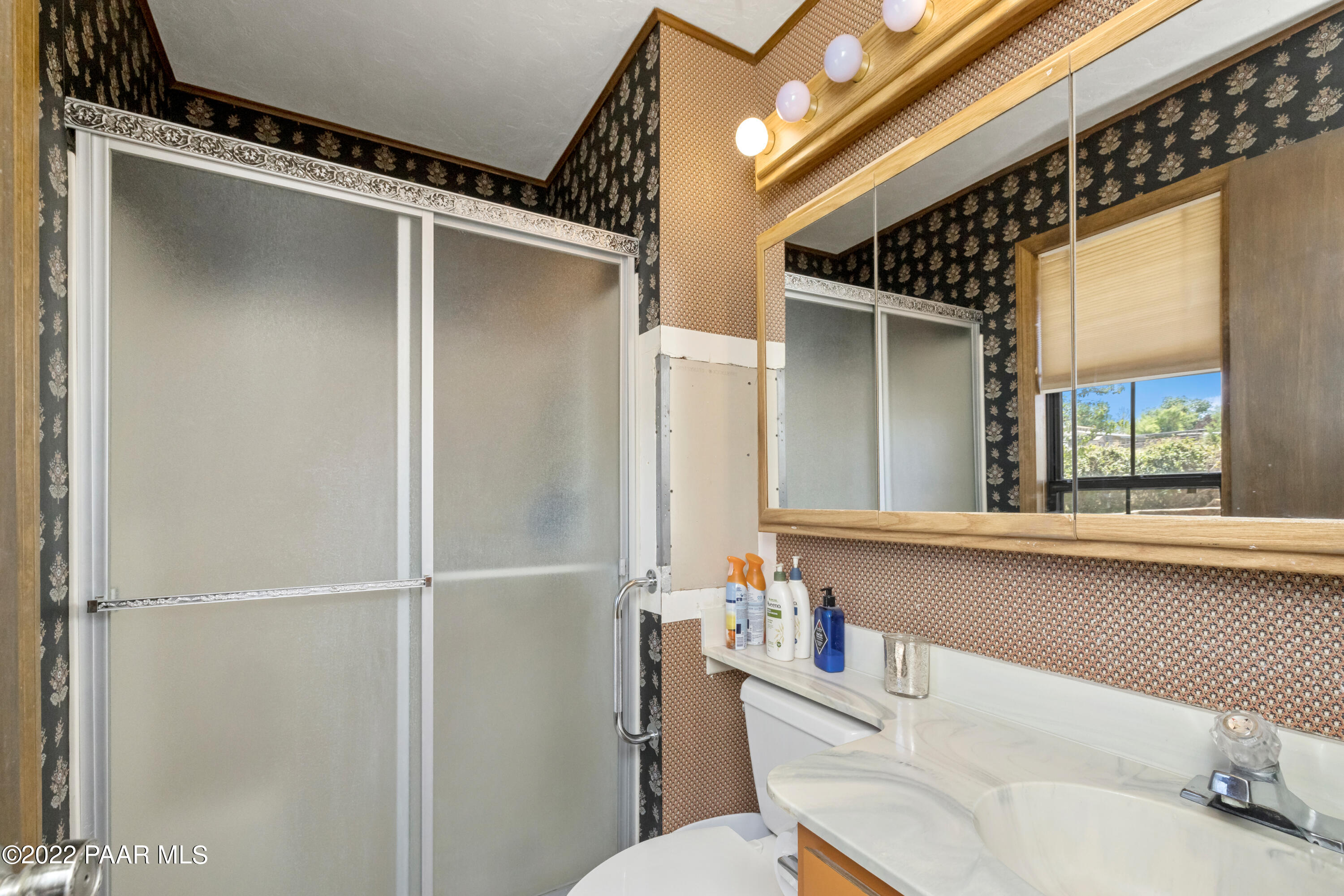 1481 West Cliff Rose Road Prescott, AZ 86305 - Photo 16 of 38 a bathroom with a tub and shower