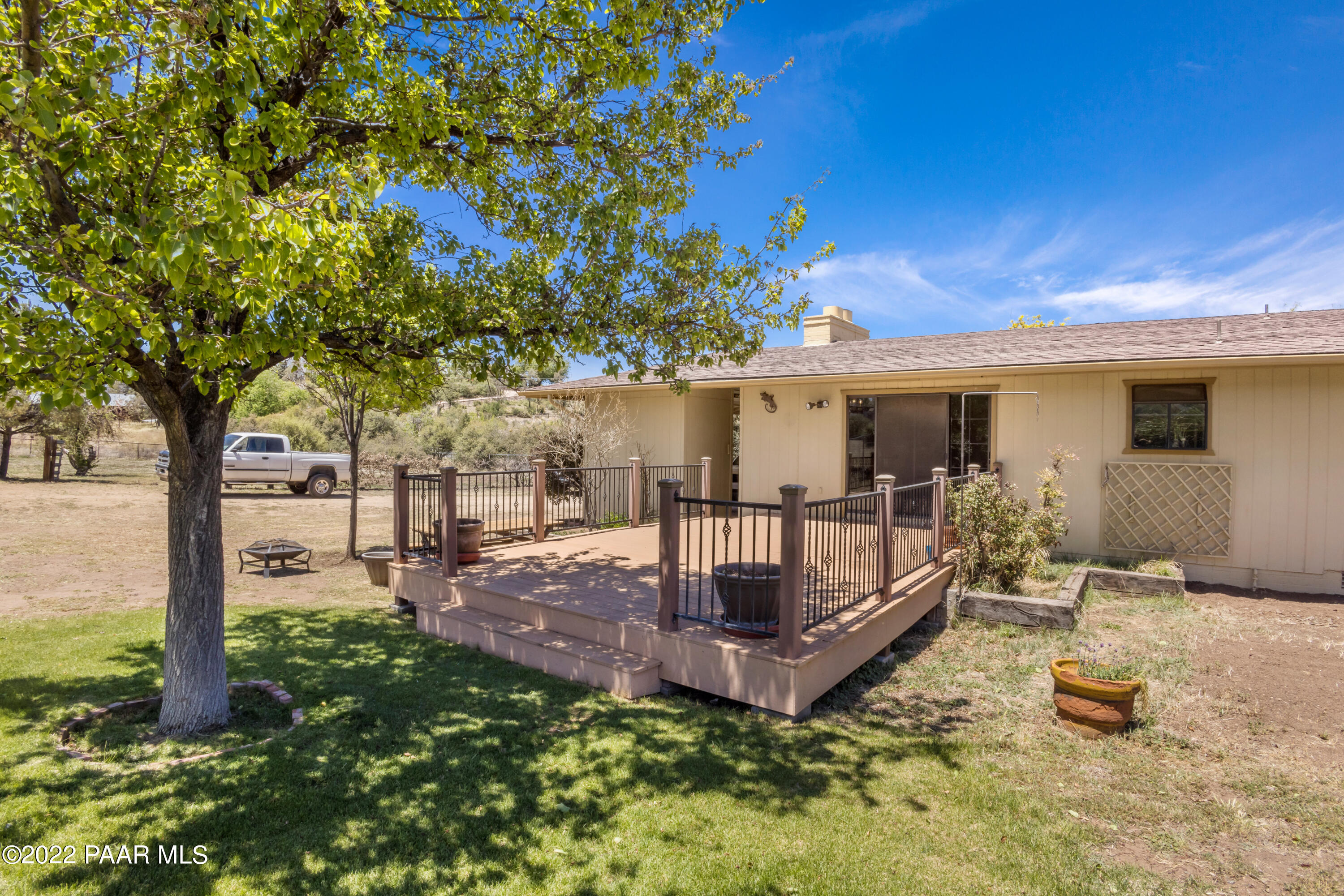 1481 West Cliff Rose Road Prescott, AZ 86305 - Photo 26 of 38 a view of a house with backyard porch and sitting area