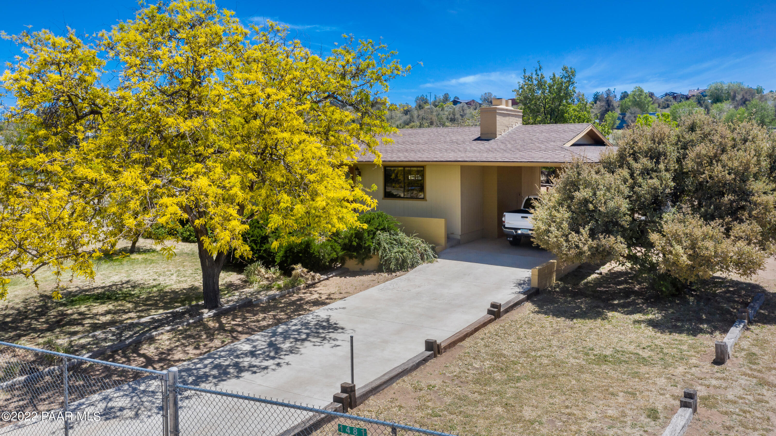 1481 West Cliff Rose Road Prescott, AZ 86305 - Photo 3 of 38 a view of a house with a tree