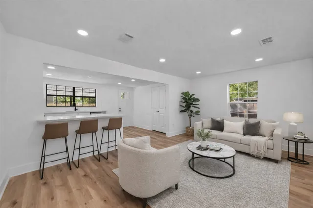 a view of kitchen with wooden floor
