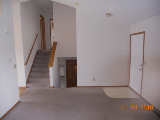 649 Bayfield Road Rockton, IL 61073 - Photo 5 of 11 a view of an empty room with stairs