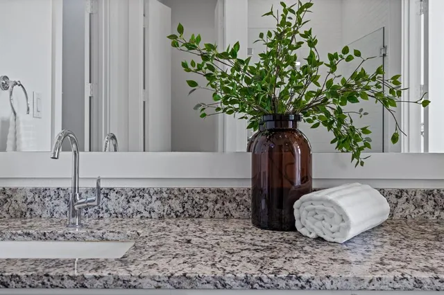a vase of flowers sitting on a table