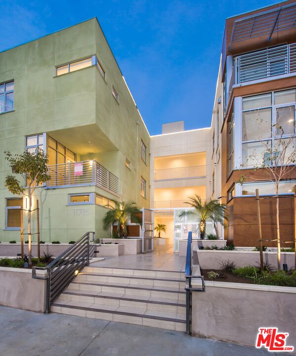 11715 Bellagio Road, Unit 305 Los Angeles, CA 90049 - Photo 25 of 25 a view of building with a street