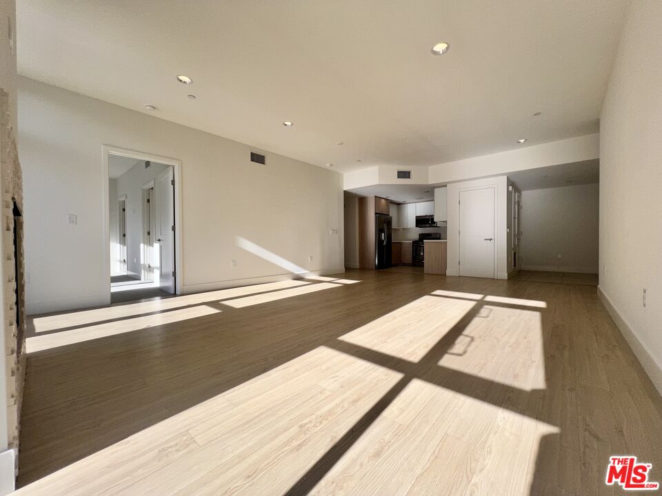 11715 Bellagio Road, Unit 305 Los Angeles, CA 90049 - Photo 4 of 25 a view of an empty room