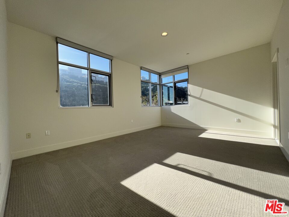 11715 Bellagio Road, Unit 305 Los Angeles, CA 90049 - Photo 8 of 25 a view of an empty room