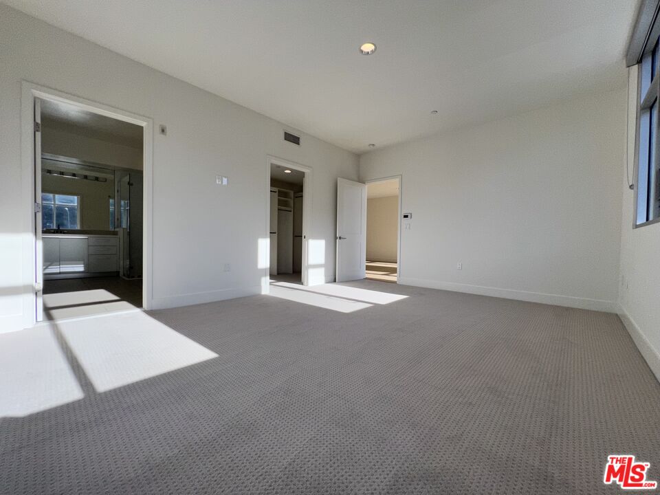 11715 Bellagio Road, Unit 305 Los Angeles, CA 90049 - Photo 9 of 25 a view of an empty room