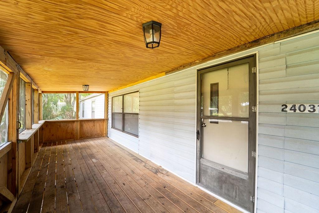 24031 Armadillo Road Astor, FL 32102 - Photo 3 of 43 a view of balcony with a sink