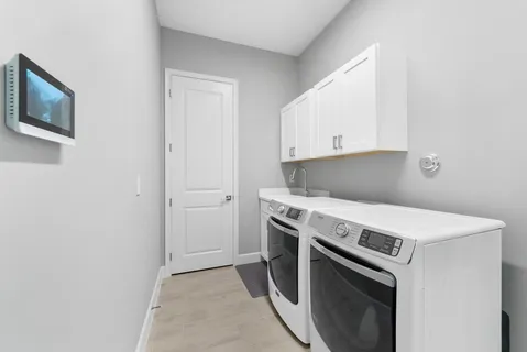 a kitchen with a stove and a microwave