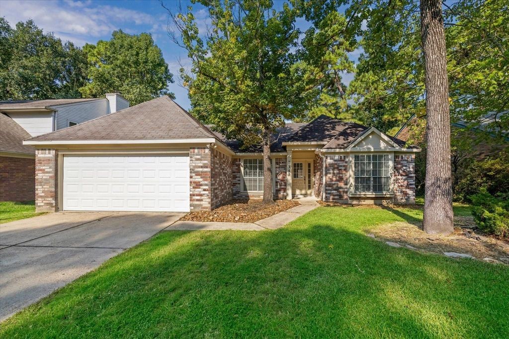 143 West Village Knoll Circle Spring, TX 77381 - Photo 1 of 27 Welcome to this charming single-story brick home featuring a two-car garage, mature trees, and timeless curb appeal. The lawn and inviting walkway set the tone for the warmth and comfort that awaits inside.