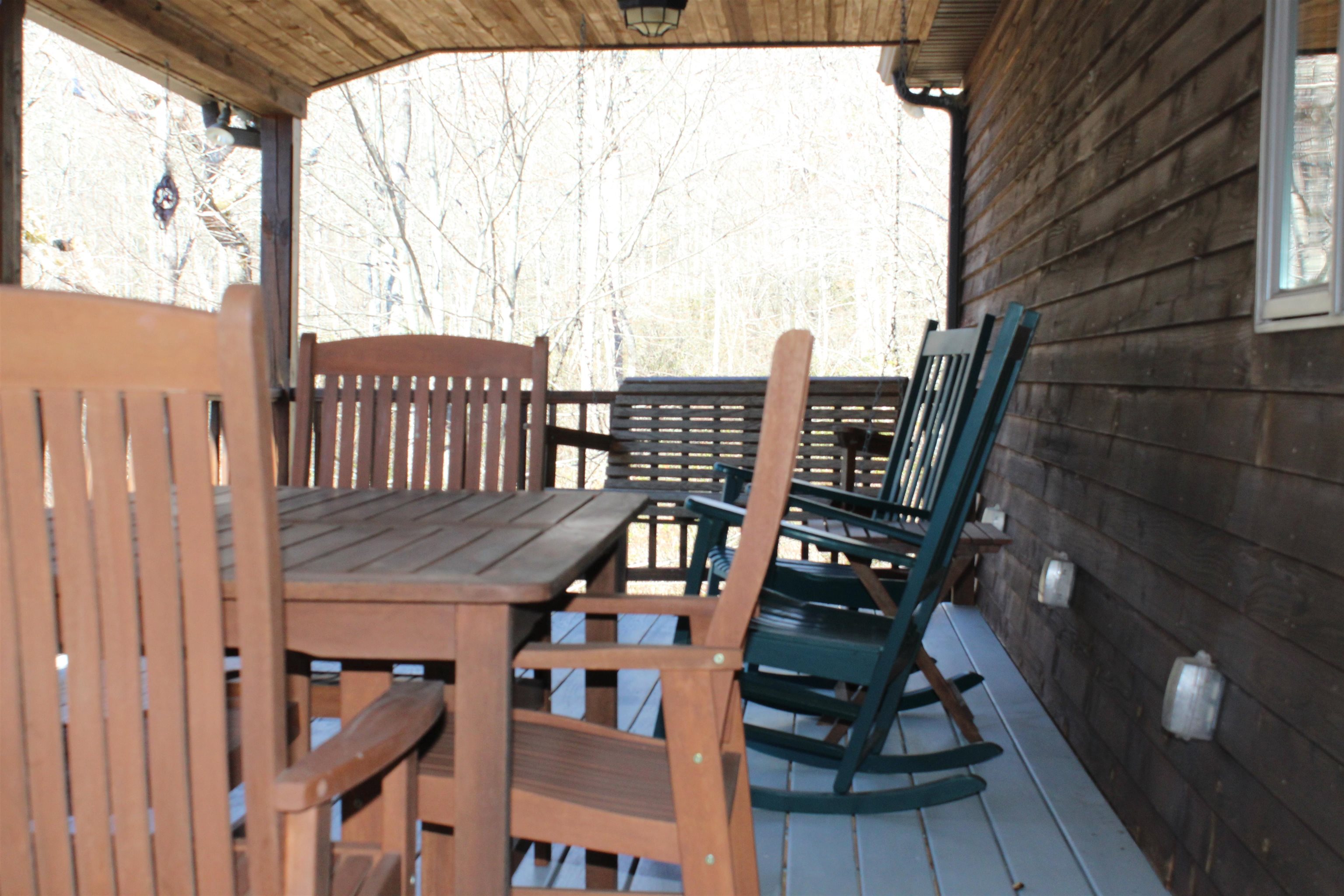 625 Hummingbird Lane Monterey, VA 24465 - Photo 19 of 65 a view of a balcony with chairs