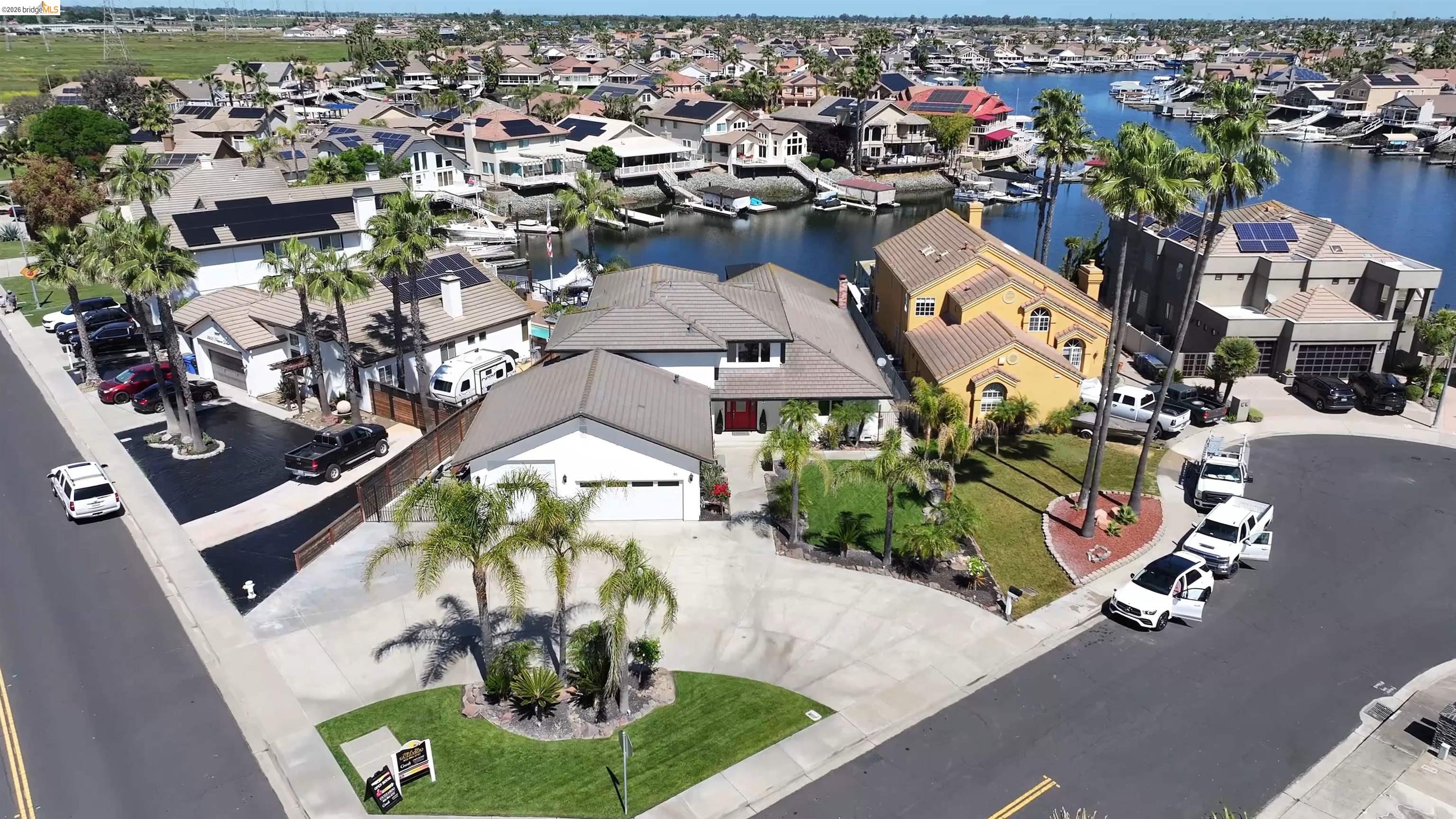 91 Shell Place Discovery Bay, CA 94505 - Photo 1 of 39 an aerial view of a house with a swimming pool yard and outdoor seating