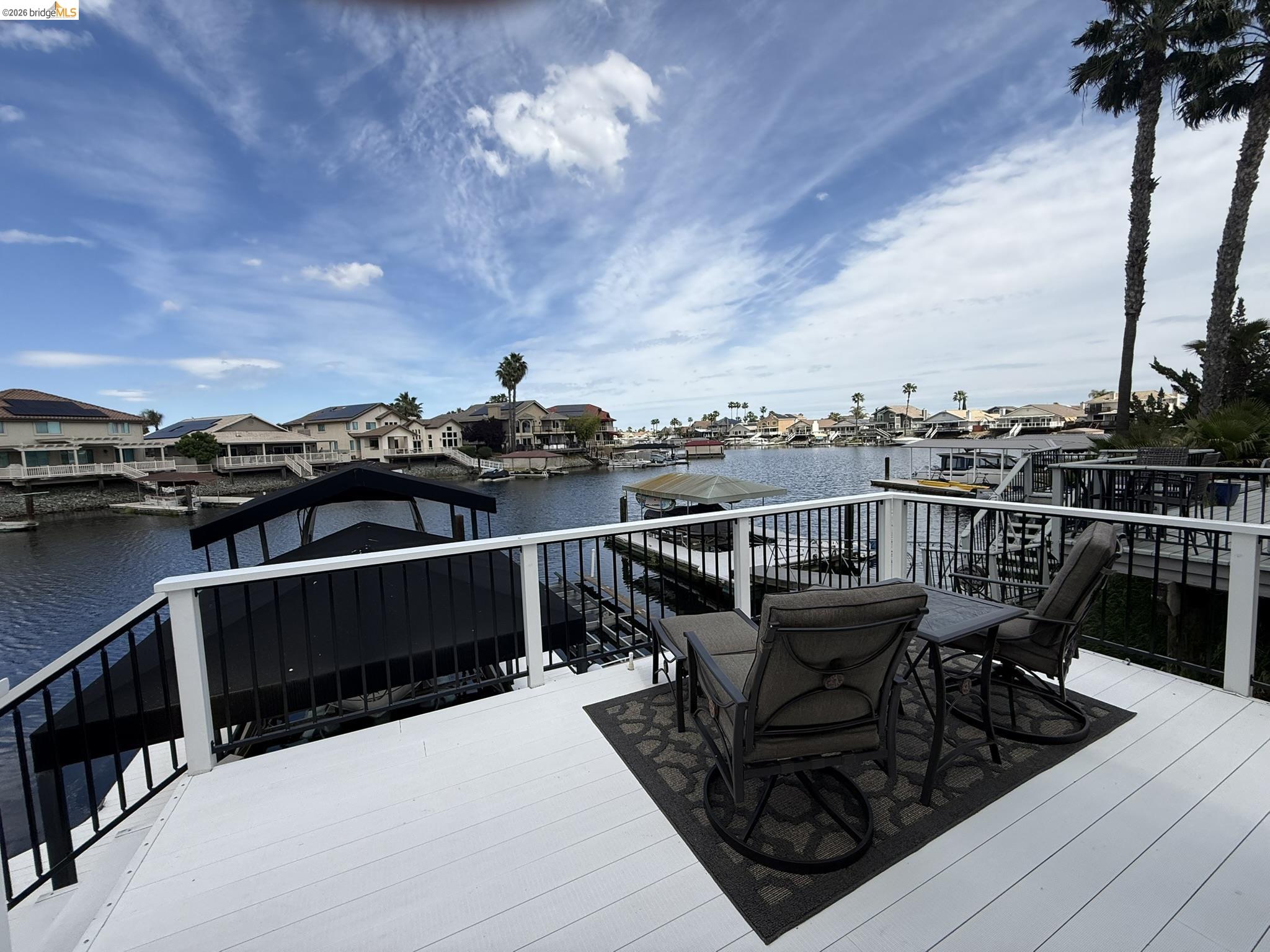 91 Shell Place Discovery Bay, CA 94505 - Photo 36 of 39 a terrace with a table and chairs