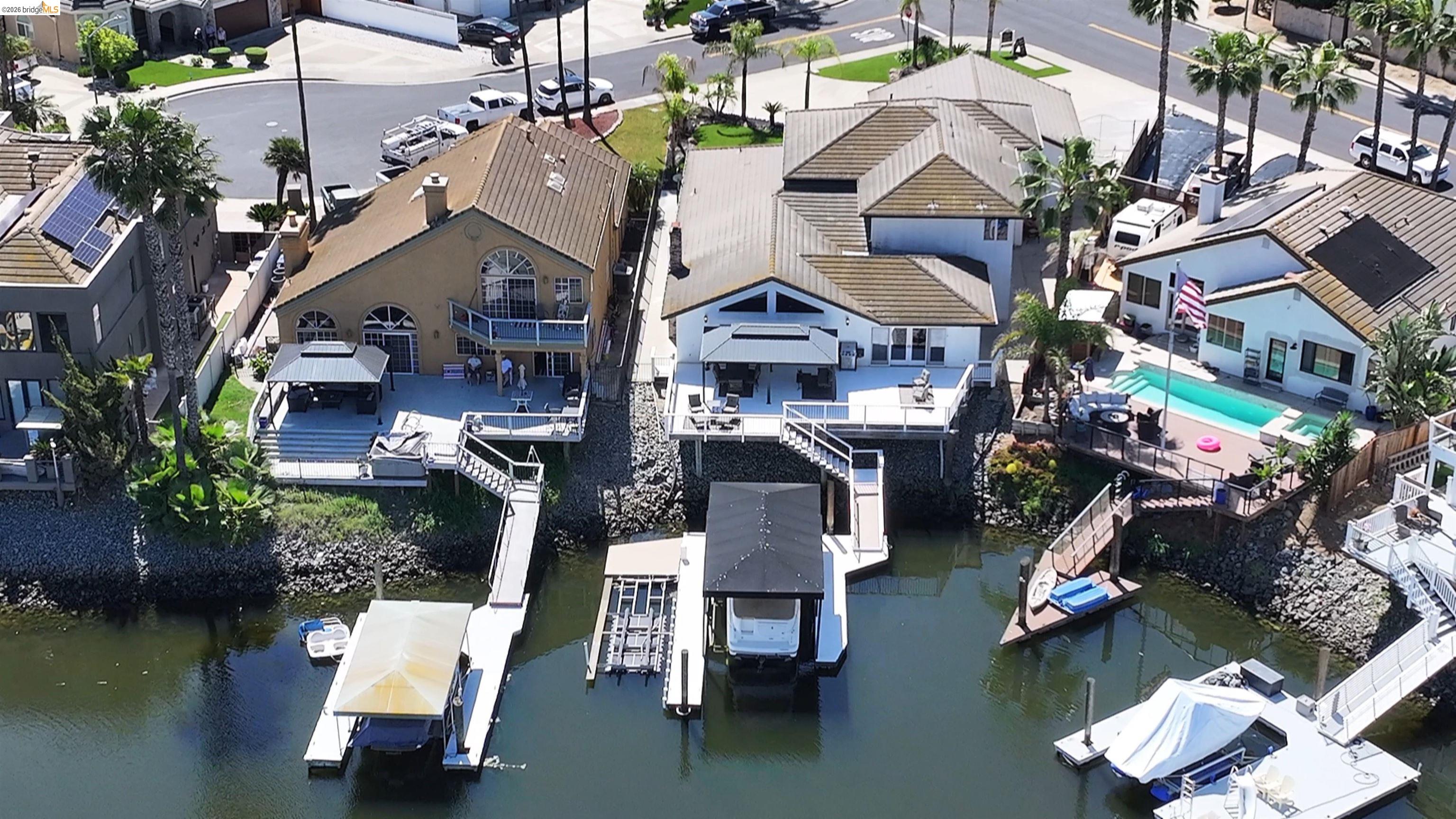 91 Shell Place Discovery Bay, CA 94505 - Photo 6 of 39 an aerial view of a house with a ocean view