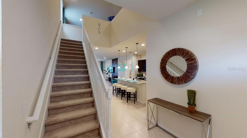2479 Dubai Street Kissimmee, FL 34747 - Photo 18 of 70 a view of entryway and hall with wooden floor