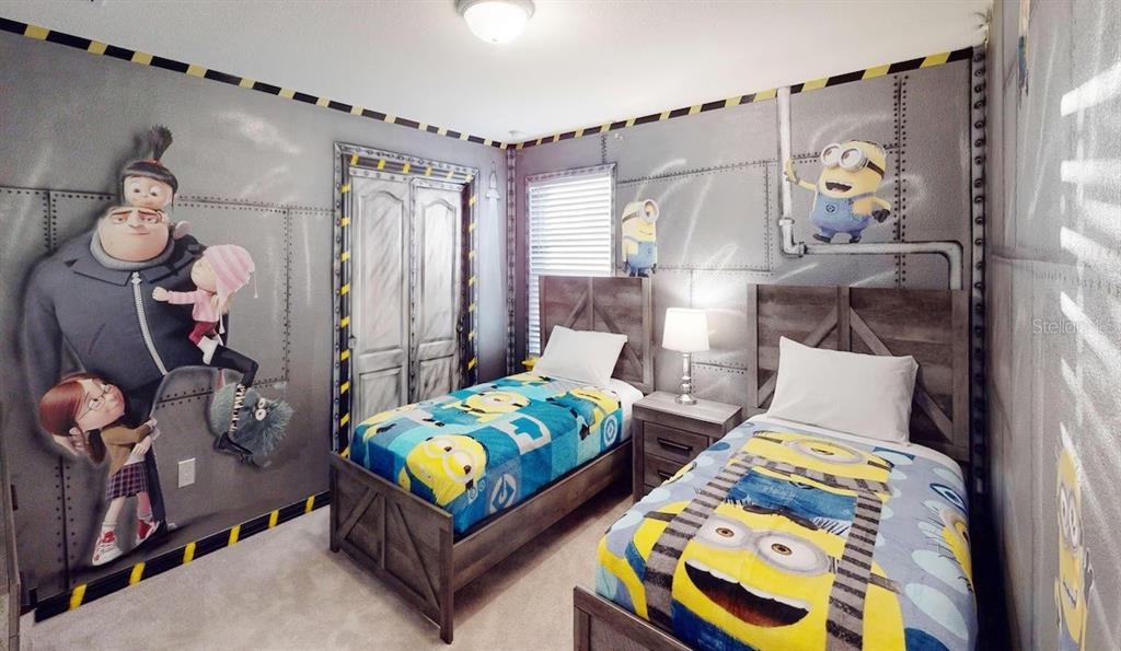 2479 Dubai Street Kissimmee, FL 34747 - Photo 2 of 70 a bedroom with bed and a window