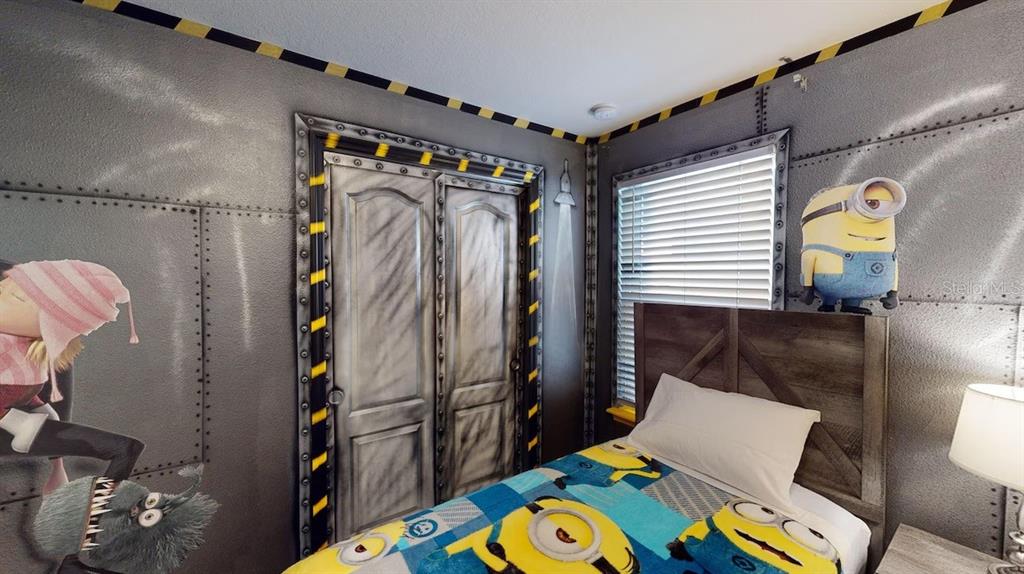 2479 Dubai Street Kissimmee, FL 34747 - Photo 3 of 70 a view of walk in closet with clothes and shoes