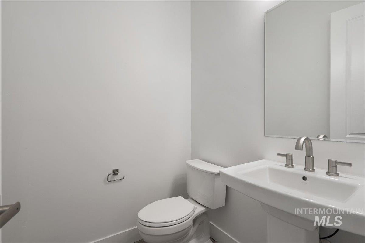 929 North Falling Water Way Eagle, ID 83616 - Photo 15 of 43 Bathroom with baseboards and toilet