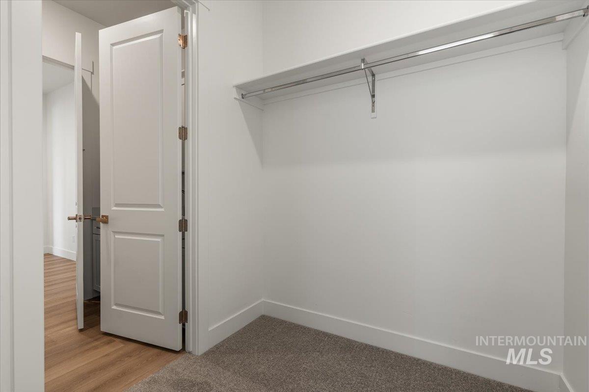 929 North Falling Water Way Eagle, ID 83616 - Photo 34 of 43 Spacious closet featuring light wood finished floors