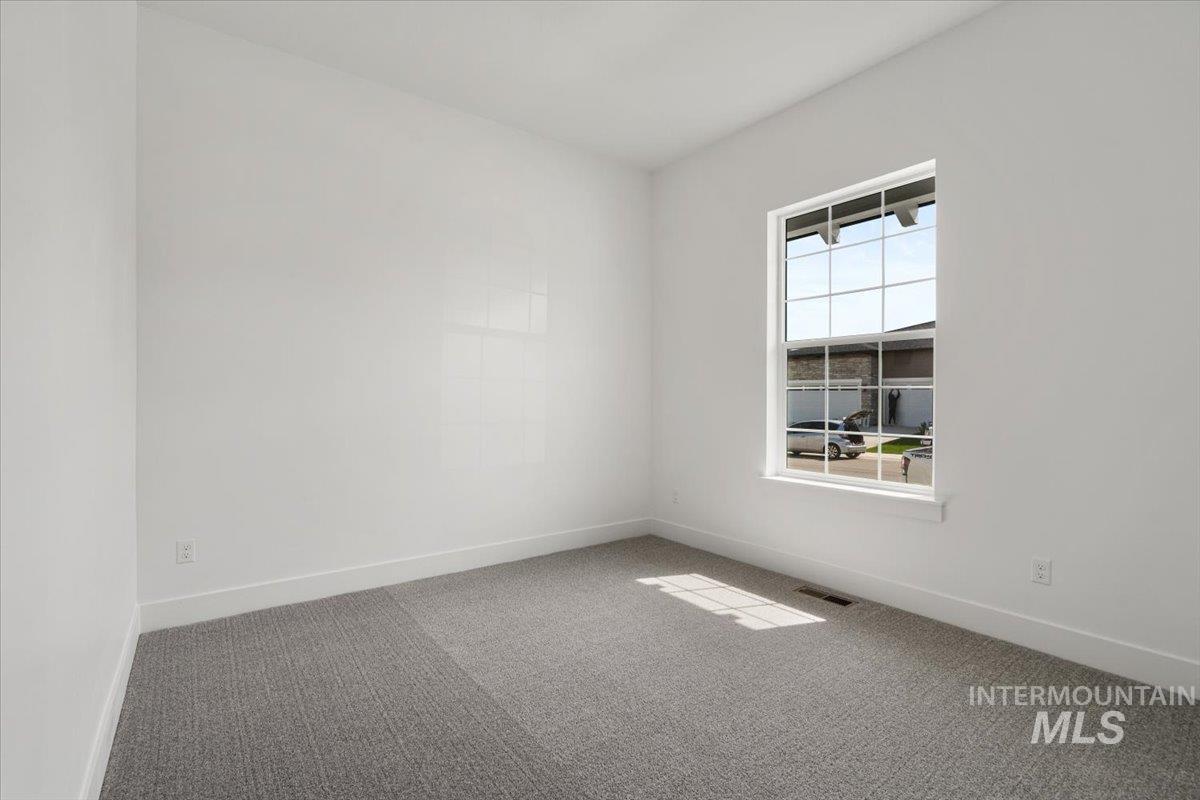 929 North Falling Water Way Eagle, ID 83616 - Photo 10 of 43 Spare room with carpet
